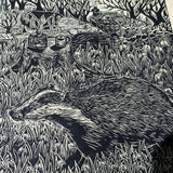 Awakening- Badger in snowdrops